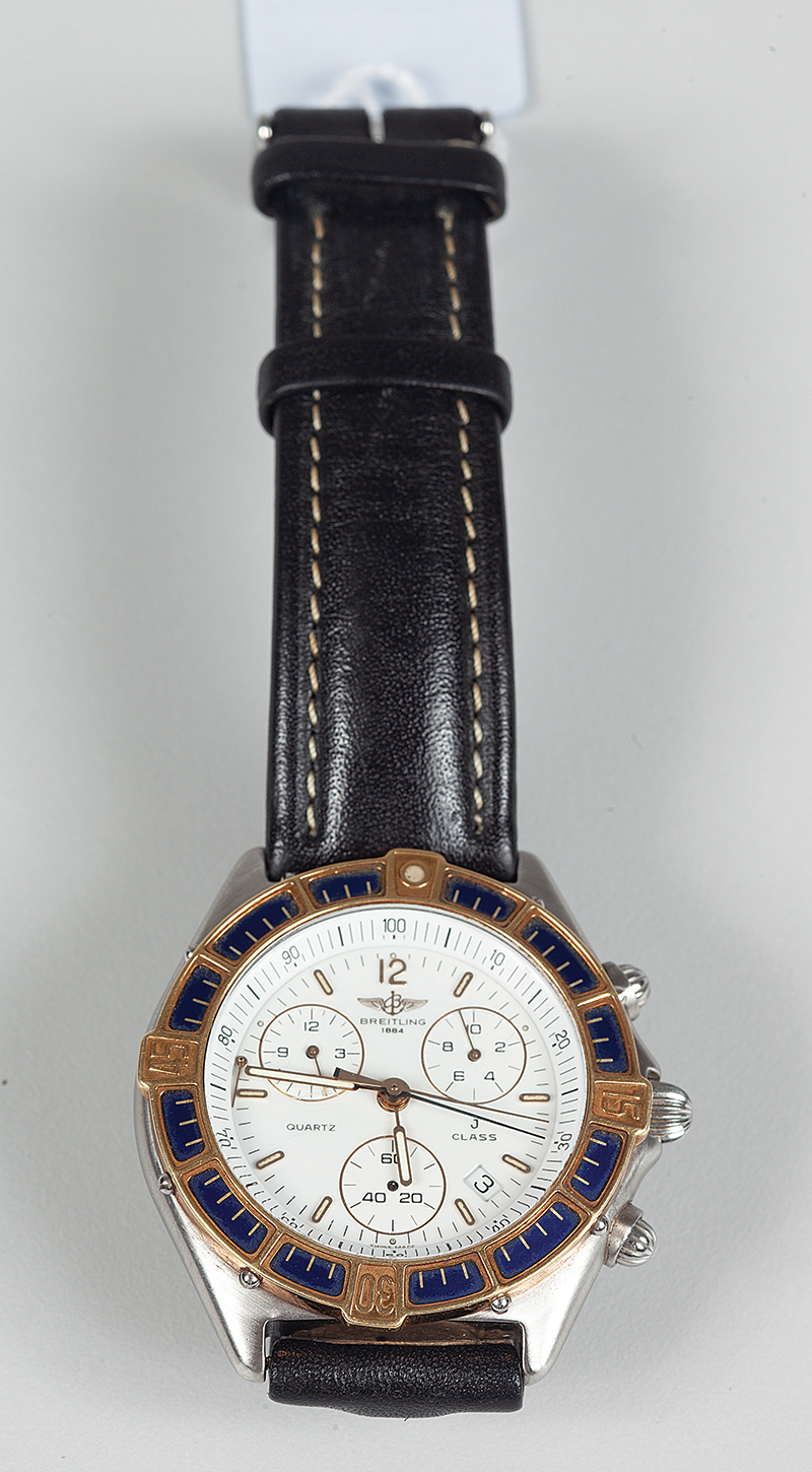 Bretling modelo `J.GLASS` relógio em aço com aro em ouro modelo masculino á quartz cronômetro.