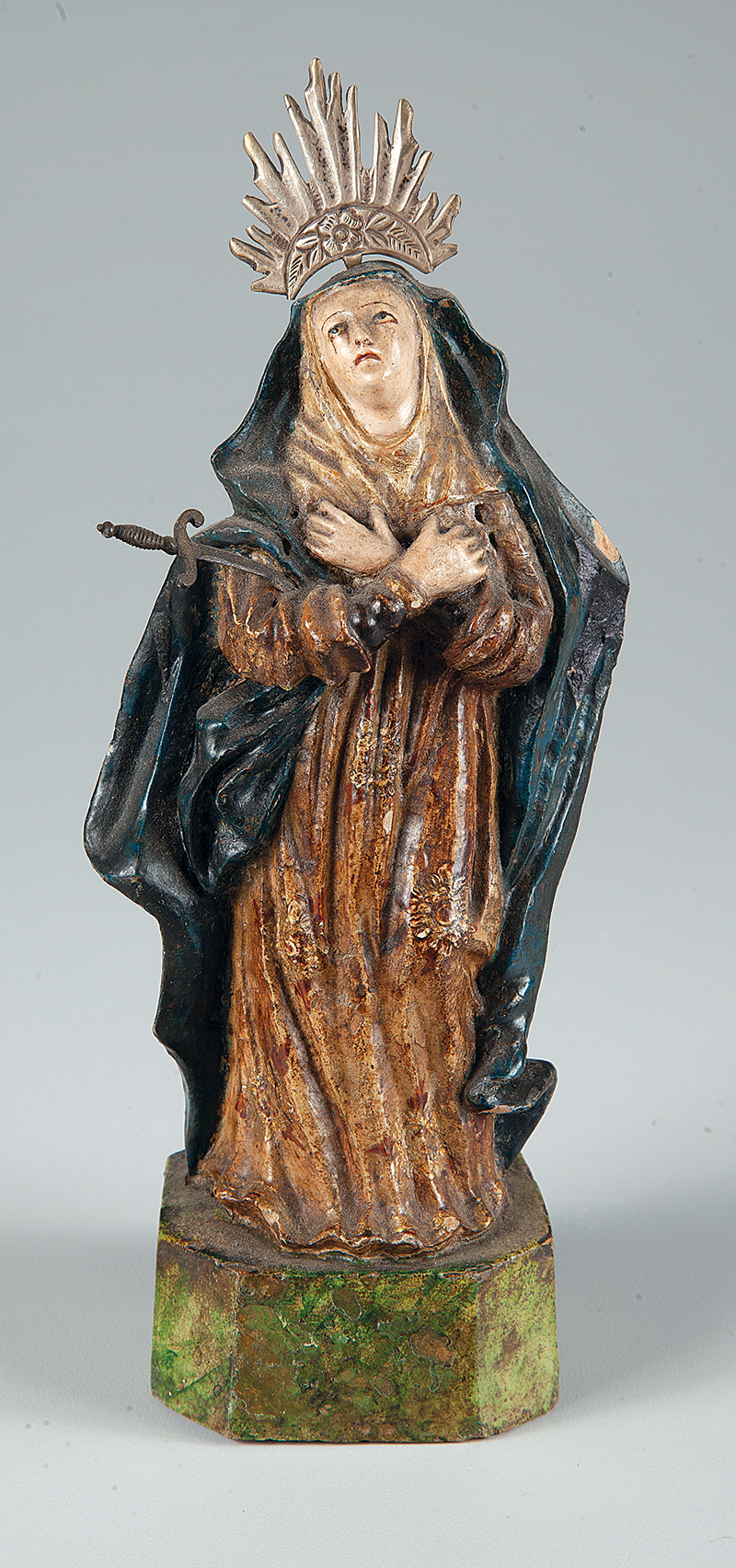 Nossa Senhora das Dores esculpida em barro policromado 19 cm. de altura ` Brasil ` Séc. XIX.