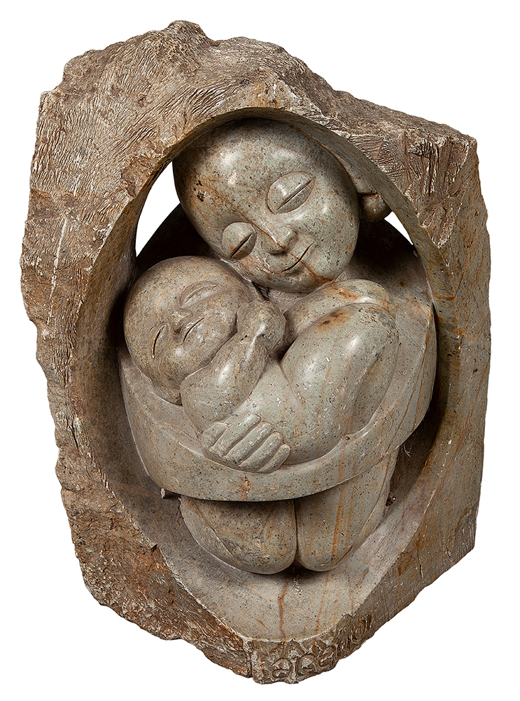 AGENOR FRANCISCO DOS SANTOS - “Maternidade” - Escultura em pedra sabão - Assinada - 50 x 34 x 29 cm.